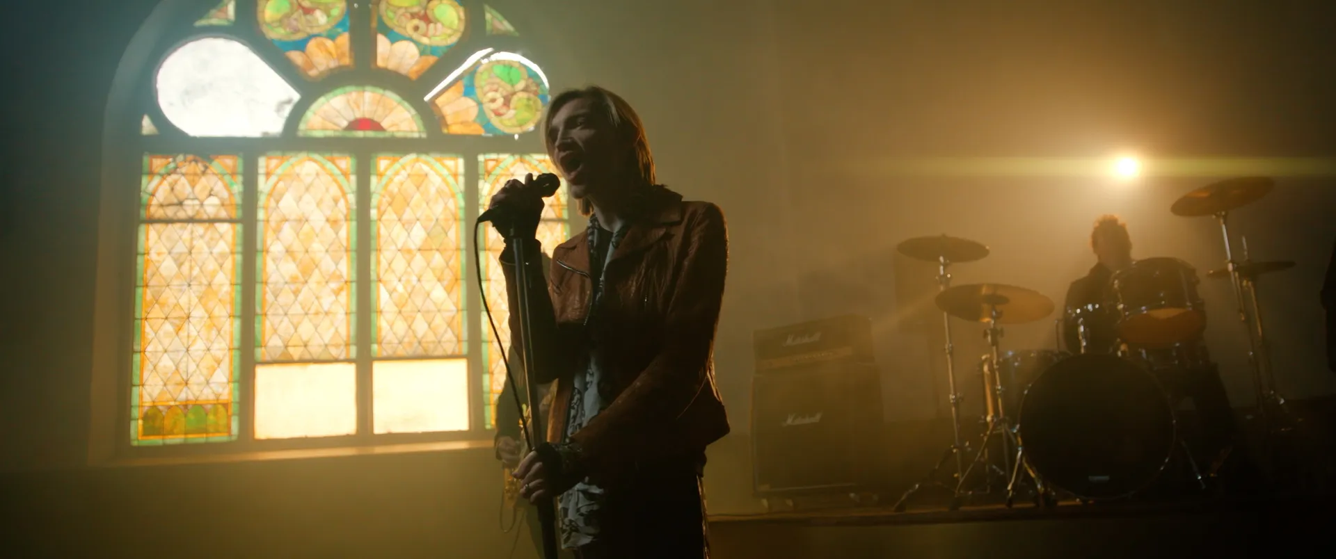 The Calling performing live under stained glass